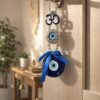 Evil Eye Wall Hanging with Om Symbol, Blue, Silver Beads, Decorative Charm, Protection Amulet Door Hanging Nazar Batu for Protection and Good Luck - Perfect for Gifting Home