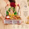 Decorative Ganesh Gift Hamper Basket with Artificial Flowers Decorative Candle and Gift Pouch Festive Home Decor Set for Gifting